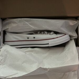 Brand new, NWT!  White CT Converse, women’s size 11, men’s size 9.